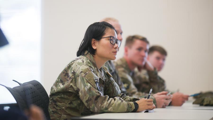 Student in military uniform in a classroom